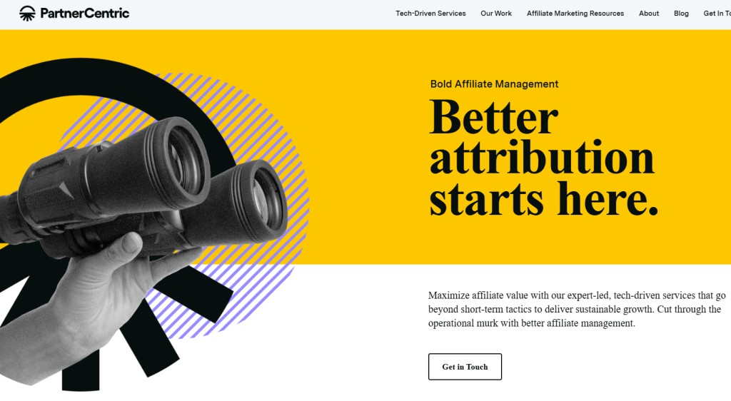 PartnerCentric homepage showcasing attribution technology with hand holding binoculars