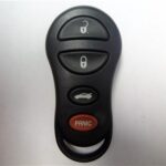 Programming a 2002 Jeep Liberty car remote key fob, part number 04602260AD shown.