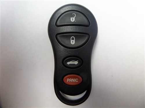 Programming a 2002 Jeep Liberty car remote key fob, part number 04602260AD shown.