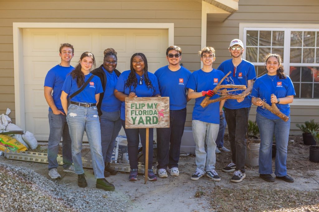 Gonzalez, third from right, and classmates during filming of Flip My Florida Yard.