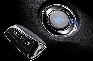 Close up of a Hyundai key fob ignition showing the key being inserted, relevant to programming your Hyundai remote