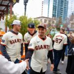 Willy Adames of the San Francisco Giants shaking hands with a fan at the 2025 Giants FanFest in San Jose