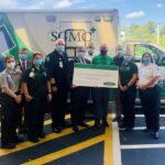 Ford Bowen and Jamie Joiner of COUNTRY Financial present a $5,000 check to South Georgia Medical Center for their Emergency Medical Services (EMS) program through Operation Helping Heroes.