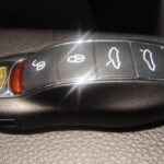 Programming a Porsche car key fob for remote access to a vehicle.