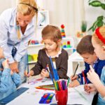 Kids working on arts and crafts in an afterschool care program.