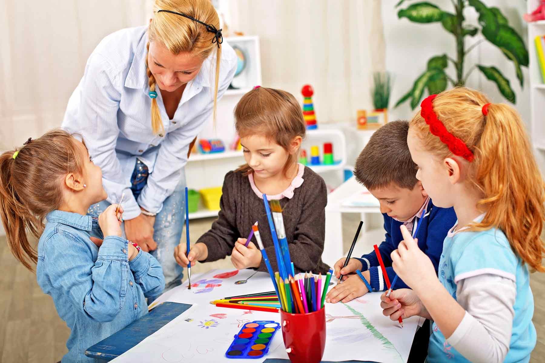 Kids working on arts and crafts in an afterschool care program.