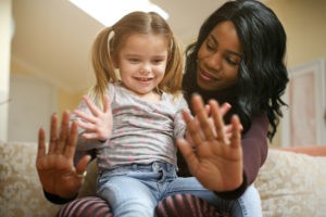 Children playing in a historical orphanage evoking early foster care concepts